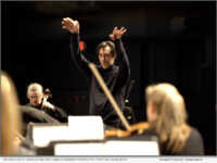 Orlando Cela, conducting the Lowell Chamber Orchestra. Photo by Adam Noya